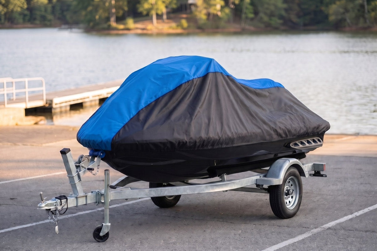 Sea-Doo GTI on its trailer under a blue and black AllGuard Weatherproof Shield cover