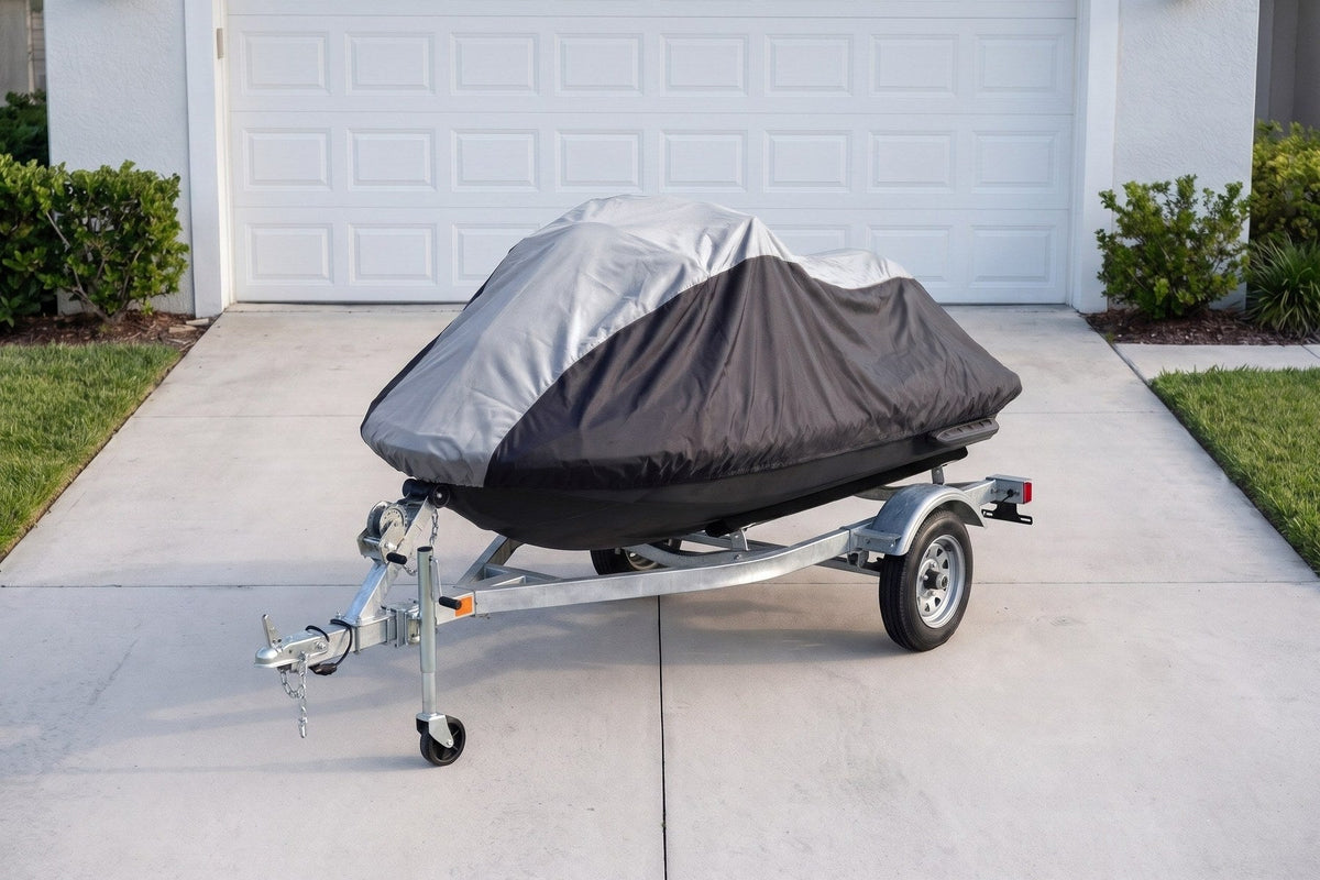 Sea-Doo Spark on its trailer under a gray and black AllGuard Weatherproof Shield cover