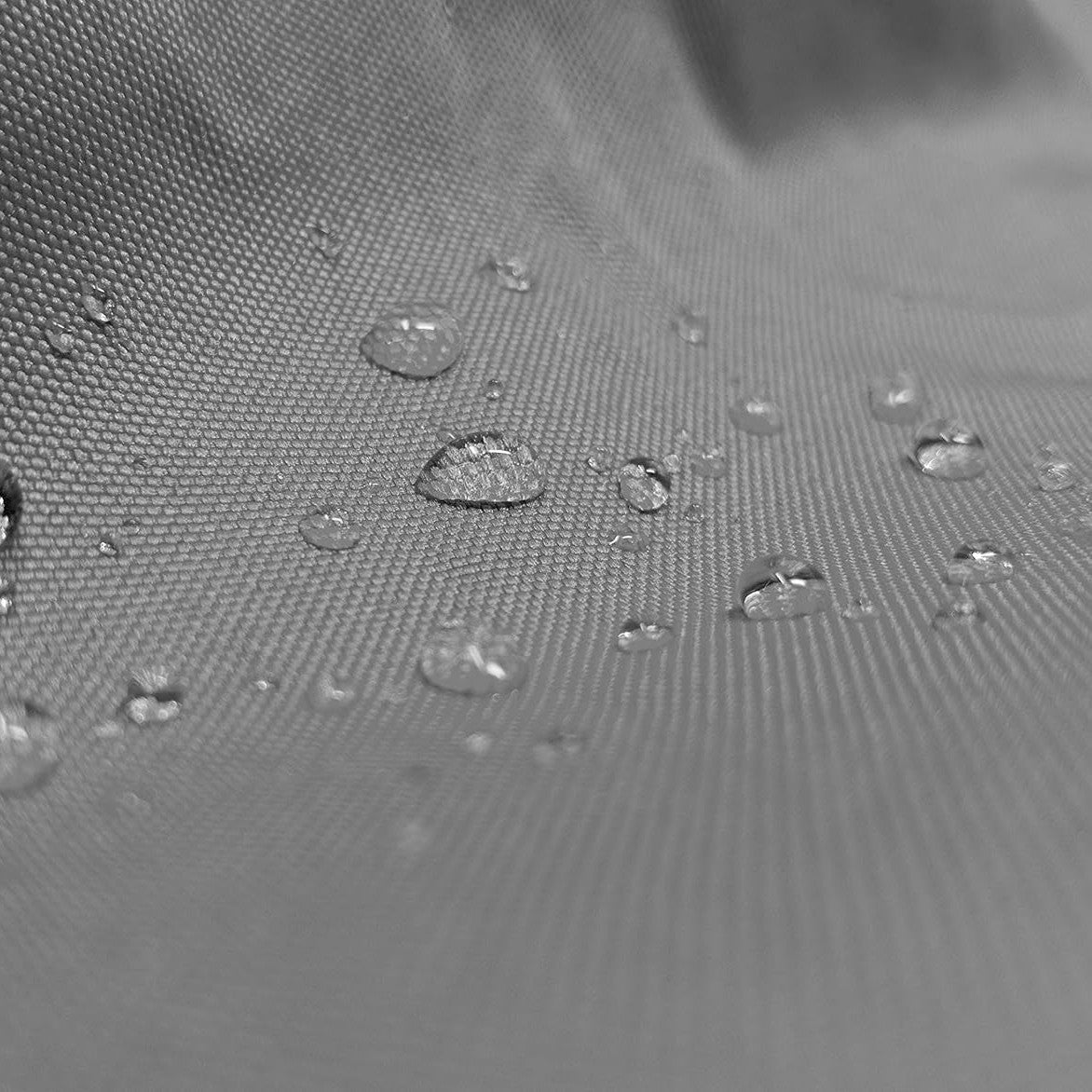 Water beading on gray Weatherproof Shield fabric, close up